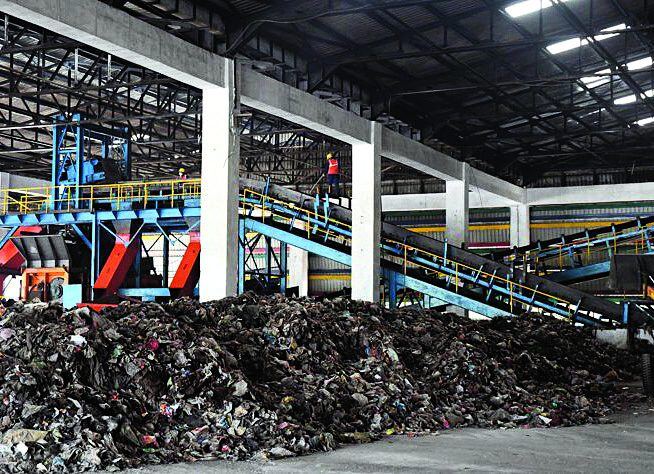 Material recovery facility with sorting conveyors