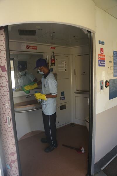 Cleaning a coach washroom