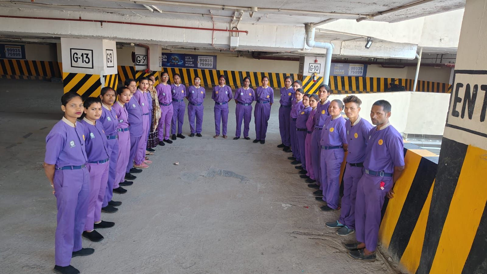 Ultra housekeeping team in uniform at a site briefing